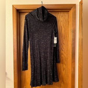 Long sleeve black dress.